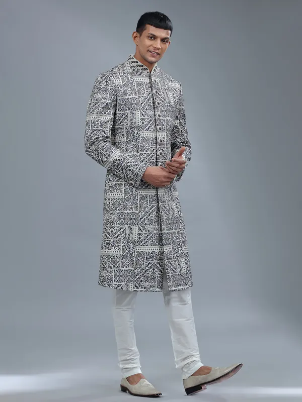 White silk sherwani with multicolor embroidery