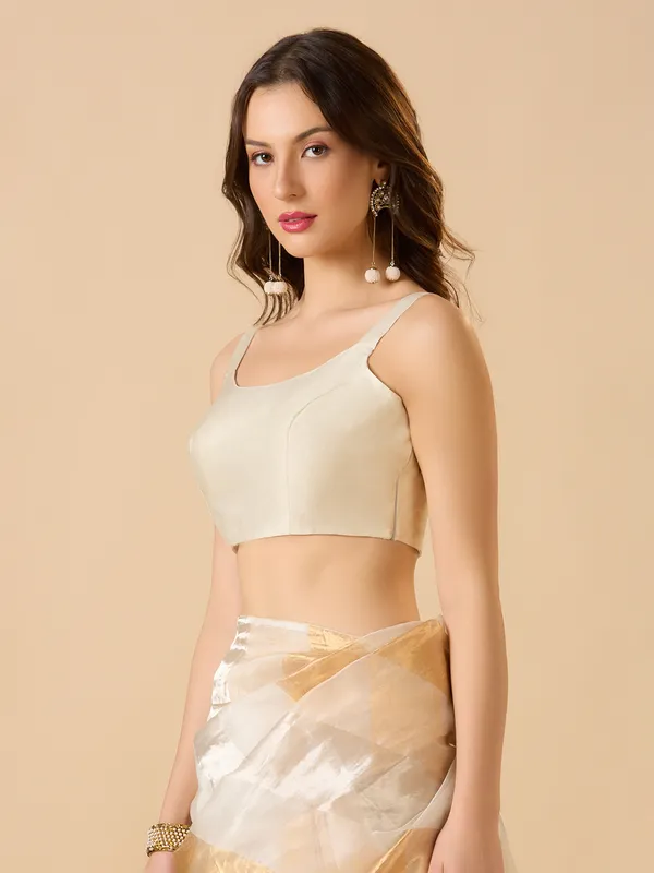 White sleeveless solid ready made blouse with round neck