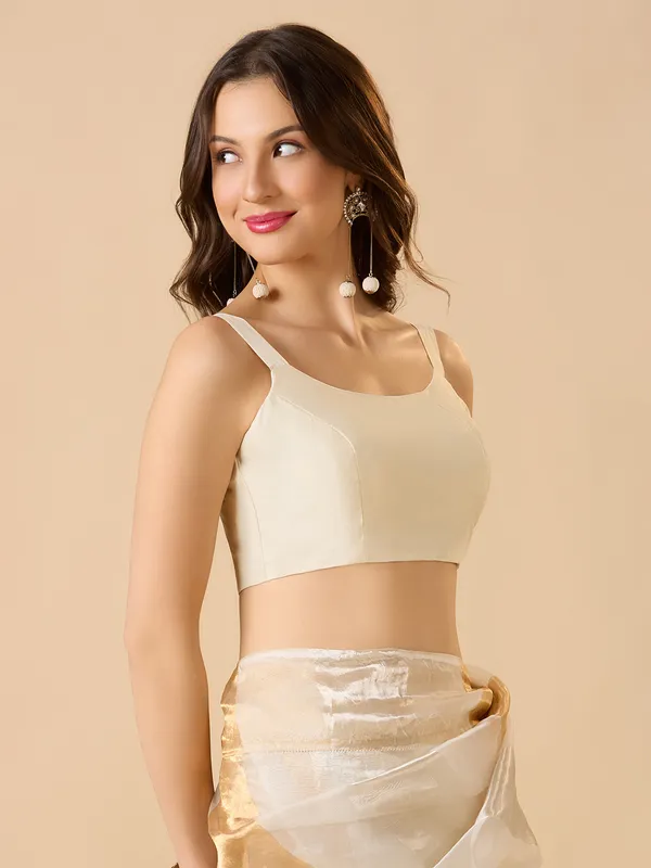 White sleeveless solid ready made blouse with round neck