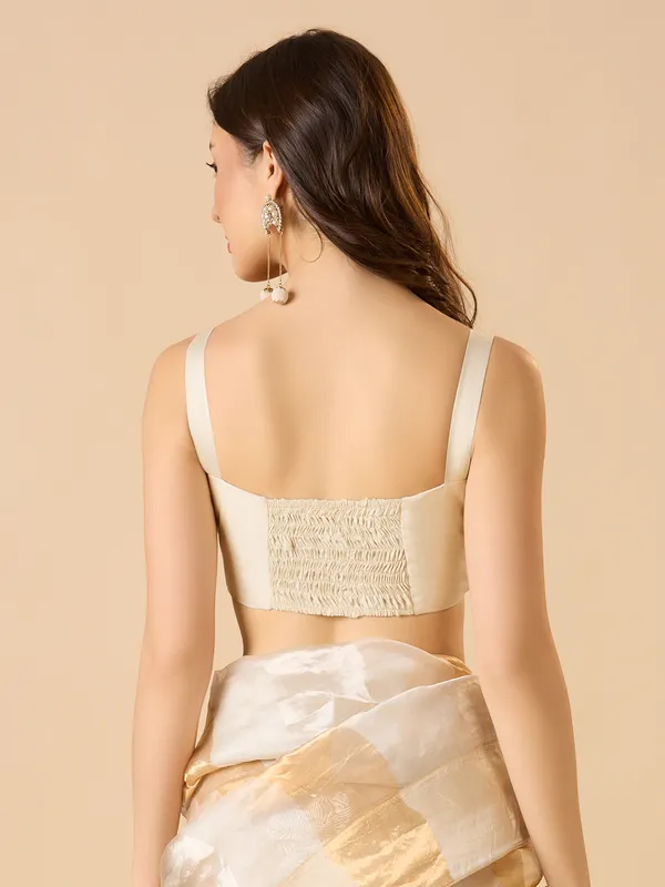White sleeveless solid ready made blouse with round neck