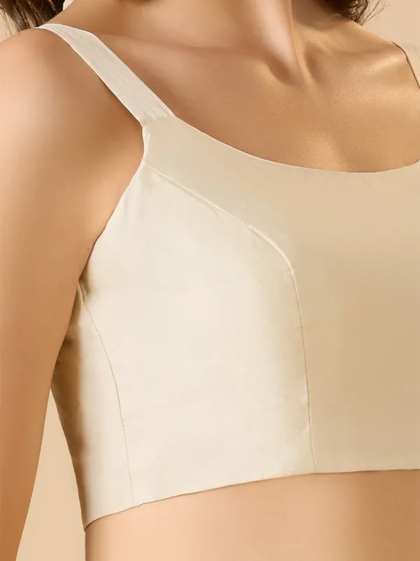 White sleeveless solid ready made blouse with round neck