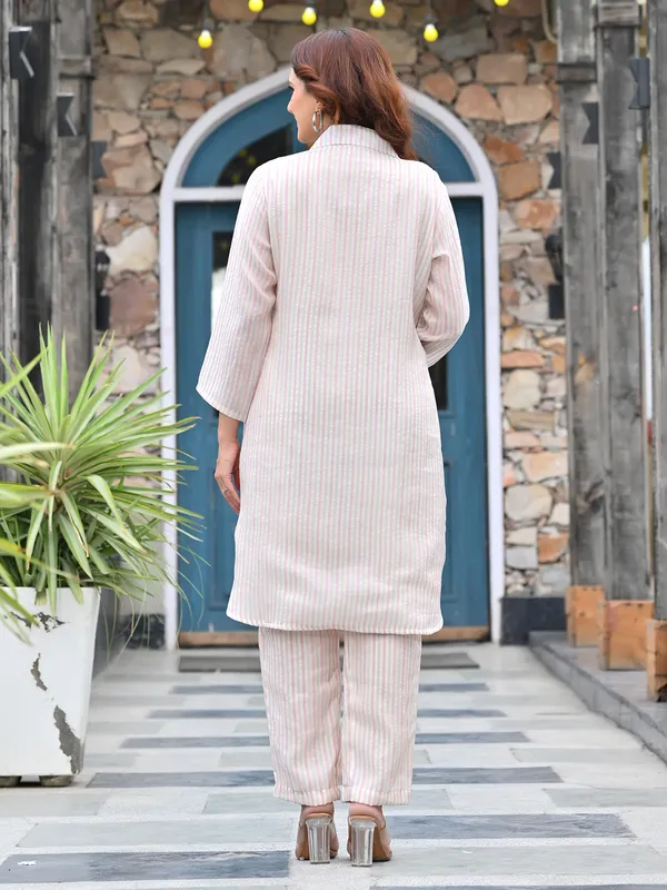 White striped suit with chic collar finish
