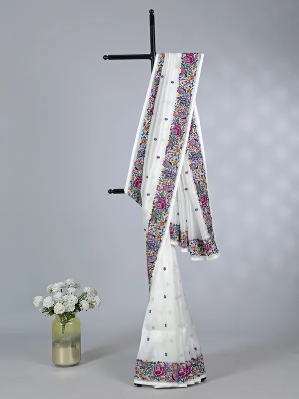 White tissue saree with intricate embroidery