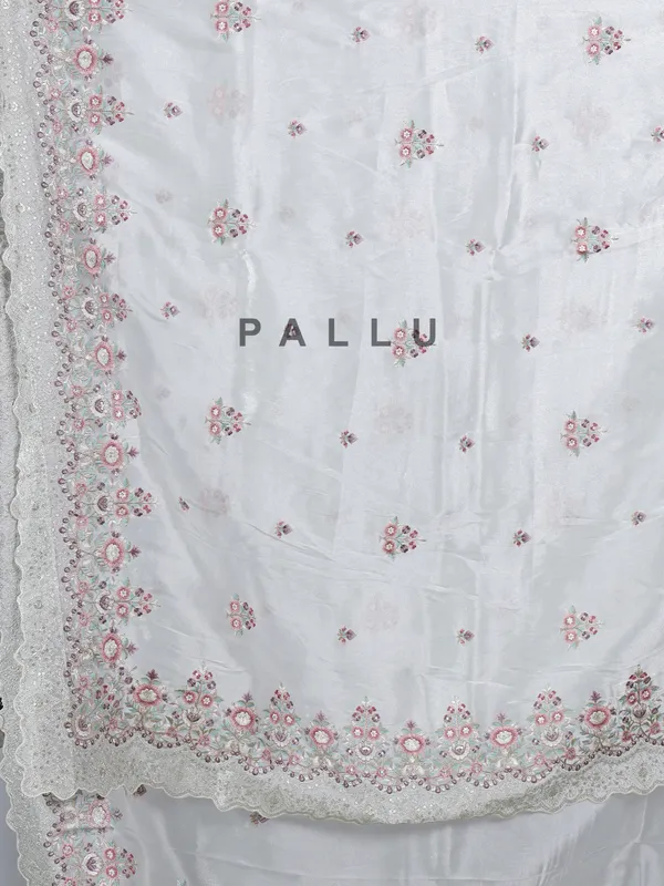 White tissue silk saree with sequins charm