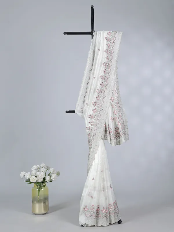 White tissue silk saree with sequins charm