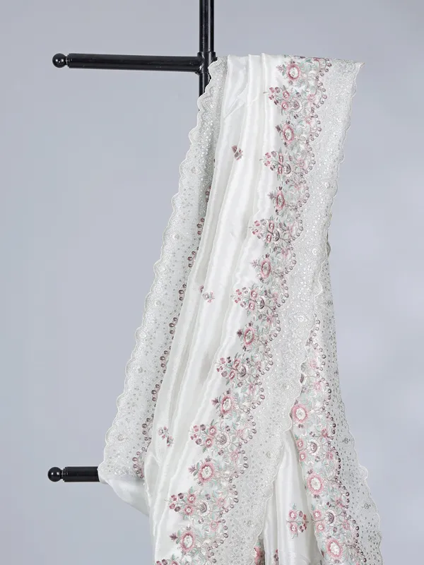 White tissue silk saree with sequins charm
