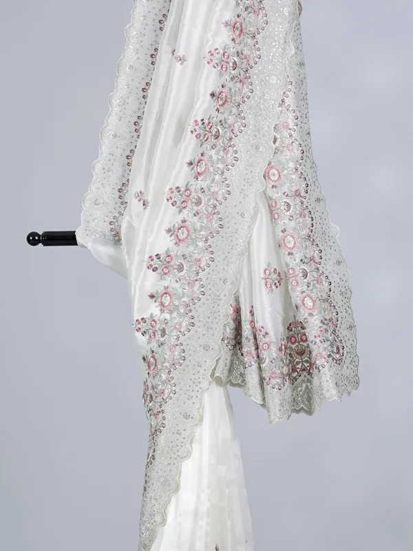 White tissue silk saree with sequins charm