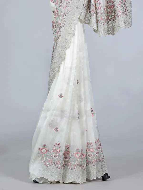 White tissue silk saree with sequins charm