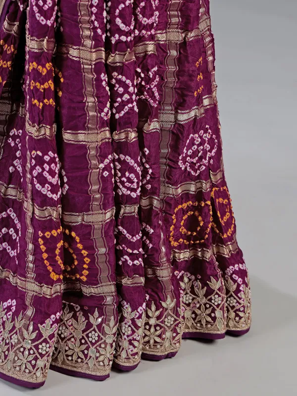 Wine bandhani saree with rich gota work
