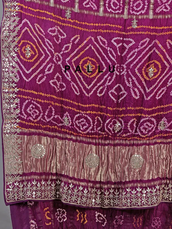 Wine bandhani saree with rich gota work