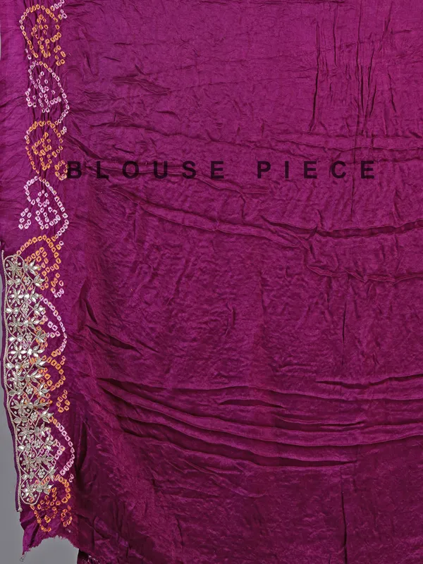 Wine bandhani saree with rich gota work