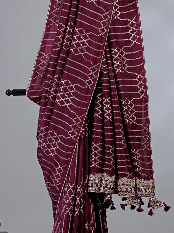 Wine dola silk saree with zari weaving