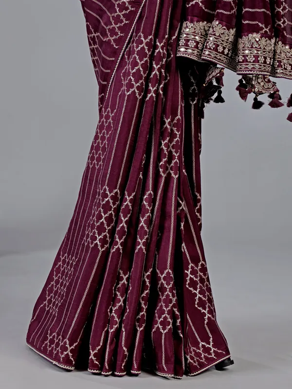 Wine dola silk saree with zari weaving