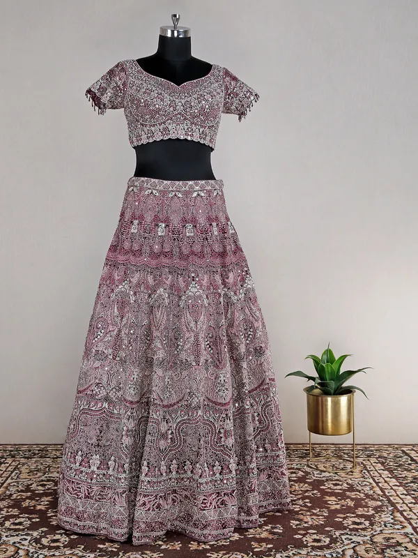 Wine heavy net lehenga choli for reception