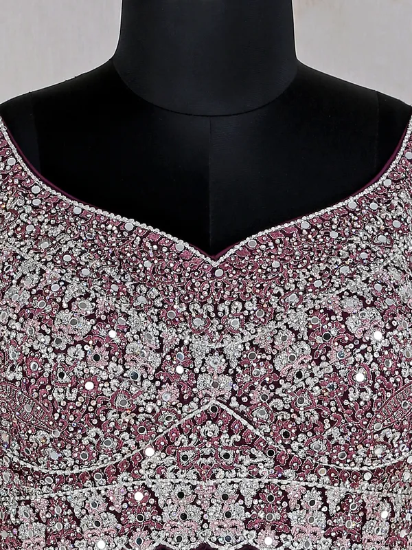 Wine heavy net lehenga choli for reception