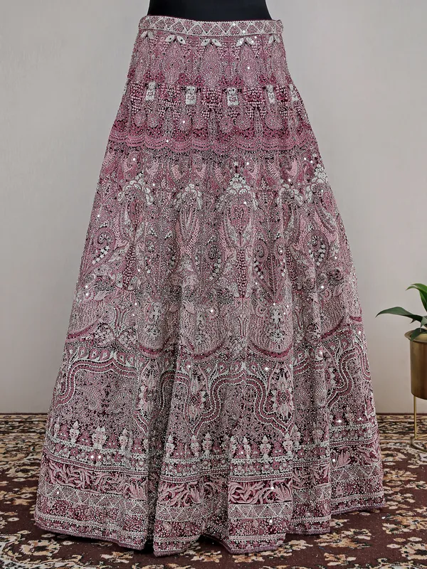 Wine heavy net lehenga choli for reception