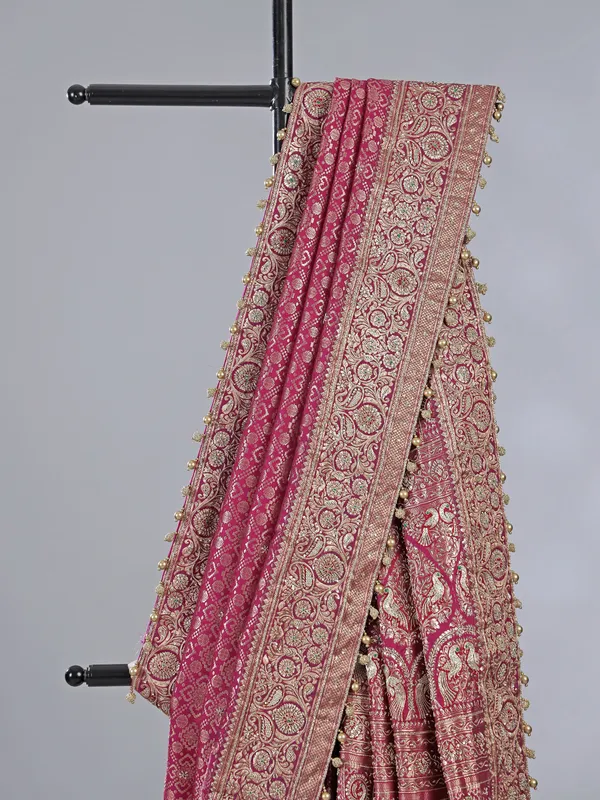Wine kanjivaram silk saree with cutdana brilliance