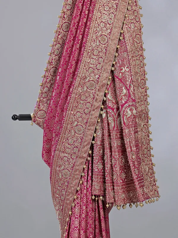 Wine kanjivaram silk saree with cutdana brilliance