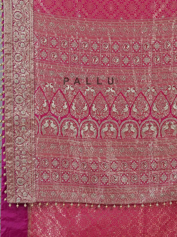 Wine kanjivaram silk saree with cutdana brilliance
