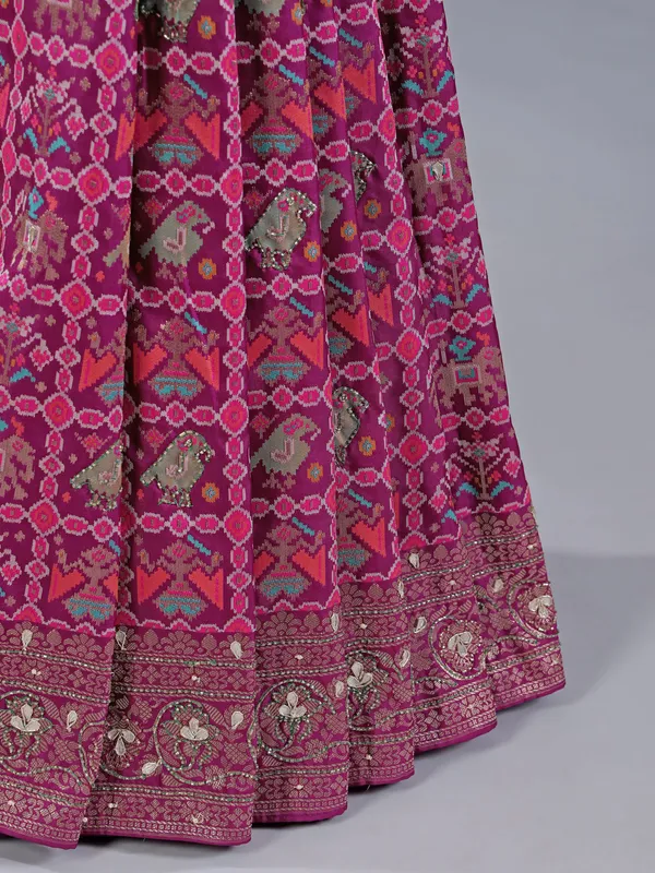 Wine silk saree for wedding celebration