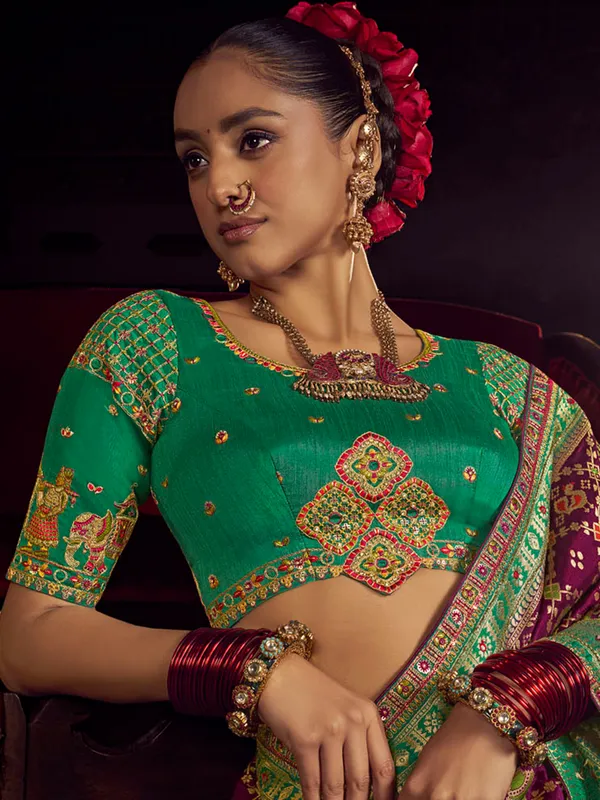 Wine silk saree with rich zari embellishment
