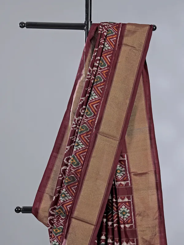 Wine zari weaving patola silk saree with regal prints
