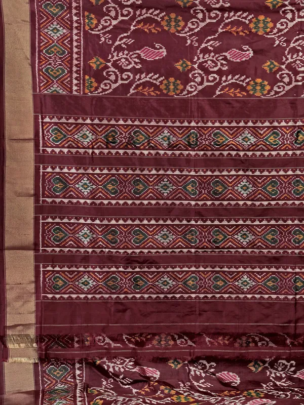 Wine zari weaving patola silk saree with regal prints