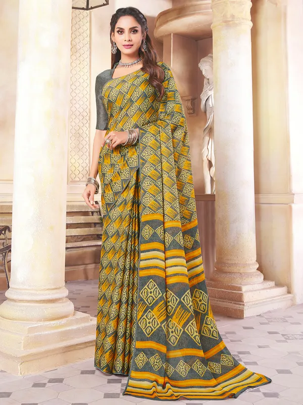 Wonderful designer crepe saree for festive in yellow and grey