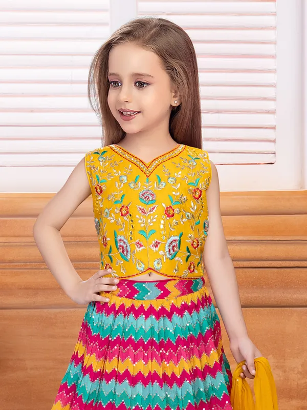 Yellow and dark pink georgette lehenga choli
