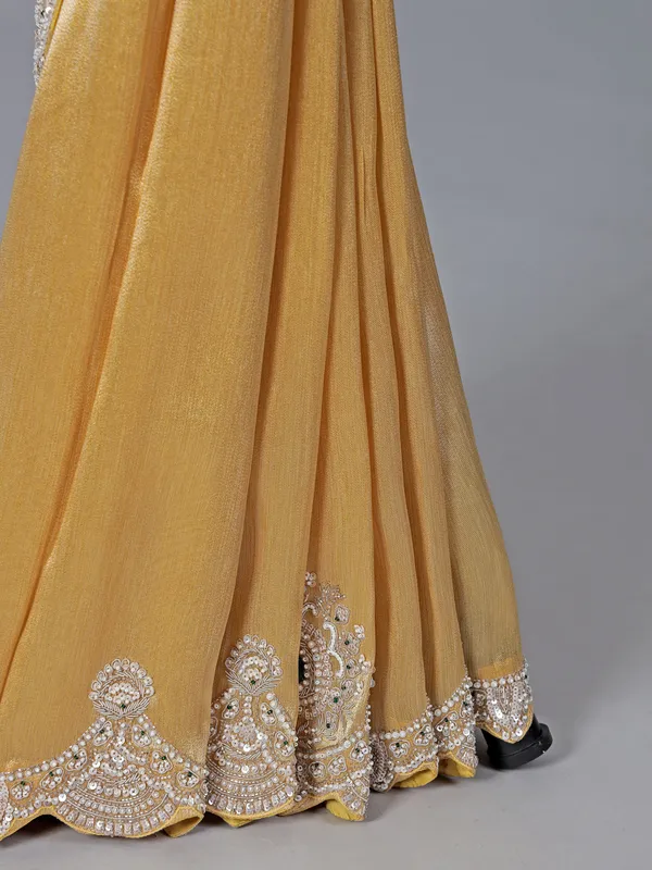 Yellow and gold shimmer dola silk saree for wedding