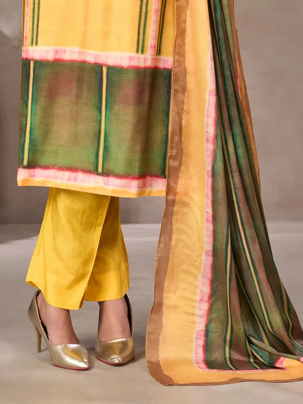 Yellow and green silk salwar suit with embroidered detail