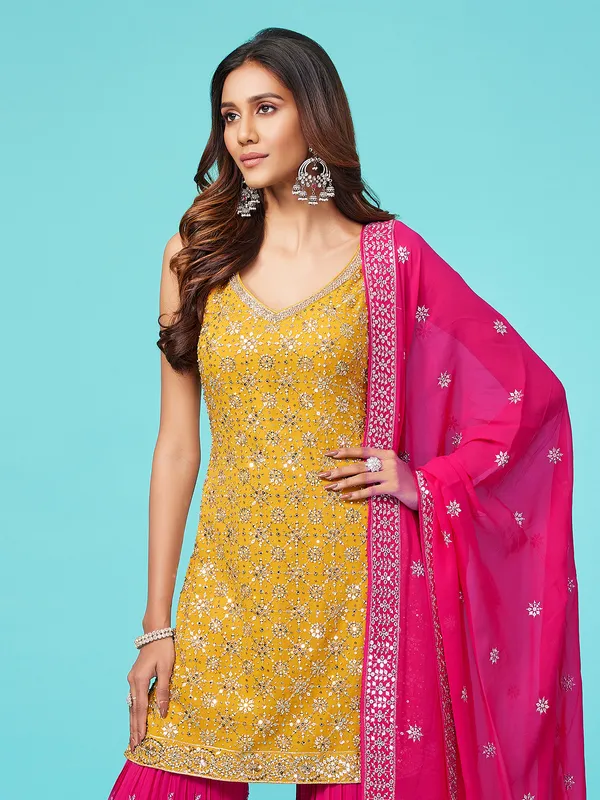Yellow and magenta georgette sharara suit
