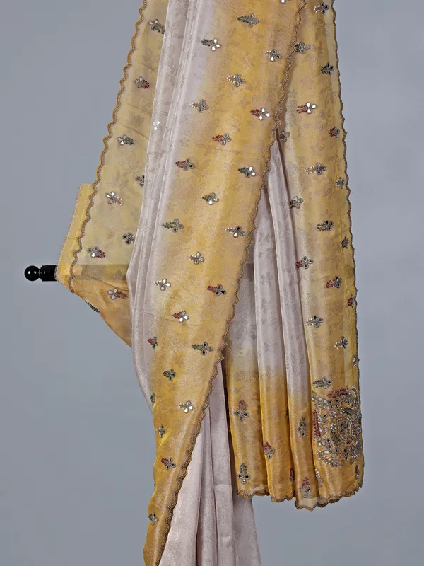 Yellow and off white tissue silk saree for receptions