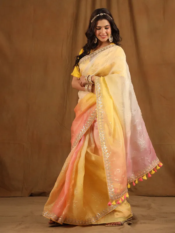 Yellow and peach shaded organza saree