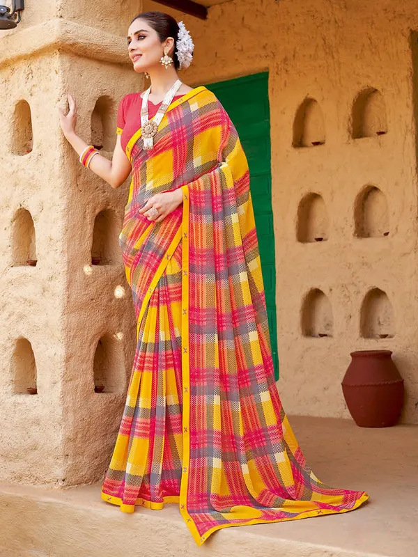 Yellow and pink printed georgette saree