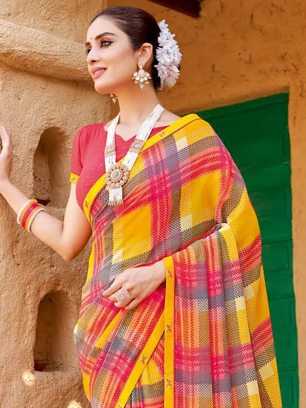 Yellow and pink printed georgette saree