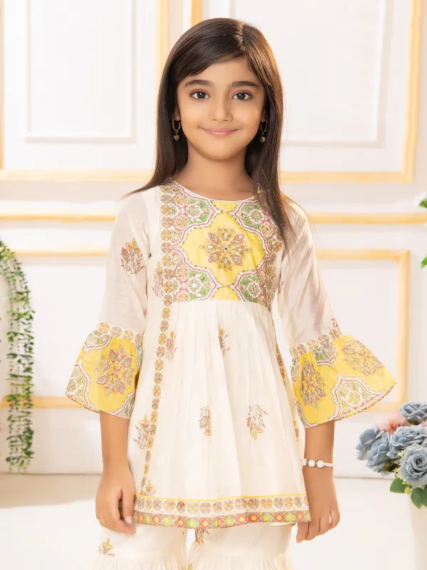 Yellow and white printed sharara suit