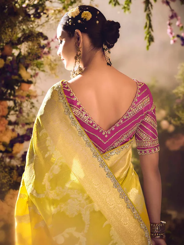 Yellow banarasi tissue saree for grand occasions