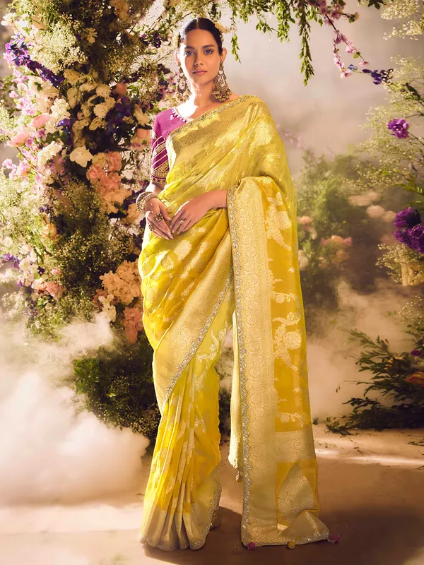 Yellow banarasi tissue saree for grand occasions