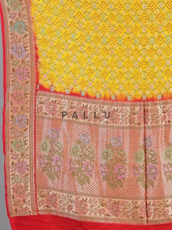 Yellow bandhej silk saree with unstitched blouse