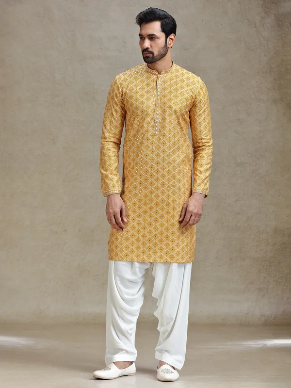 Yellow classic symmetrical embroidery patterned kurta salwar set