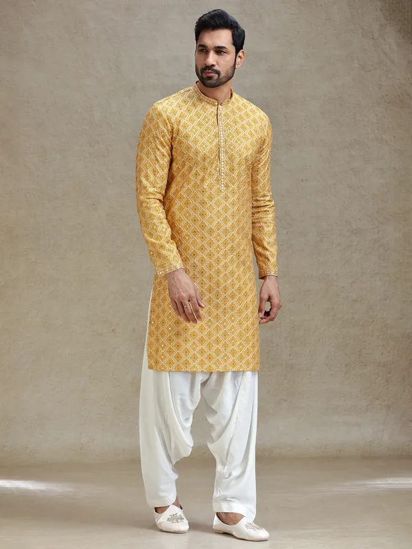 Yellow classic symmetrical embroidery patterned kurta salwar set