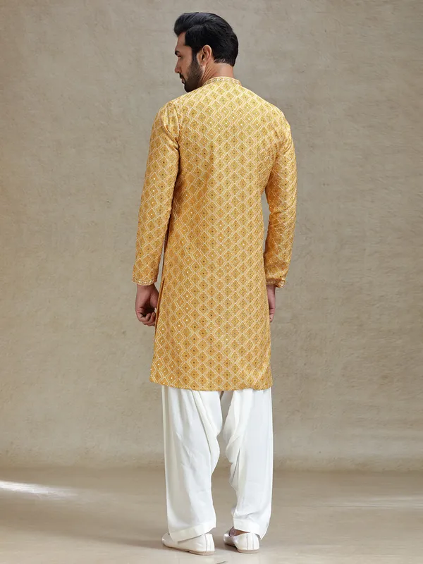 Yellow classic symmetrical embroidery patterned kurta salwar set