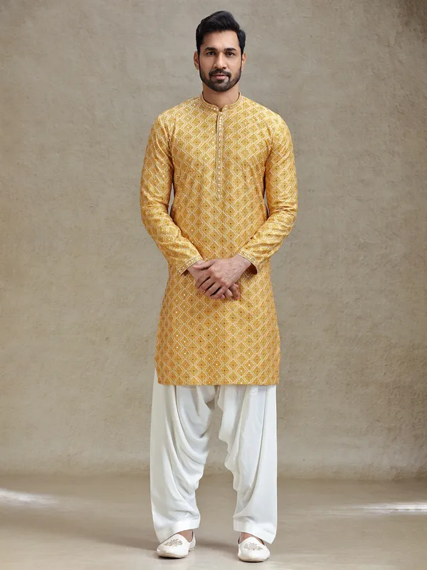 Yellow classic symmetrical embroidery patterned kurta salwar set