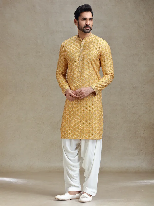 Yellow classic symmetrical embroidery patterned kurta salwar set