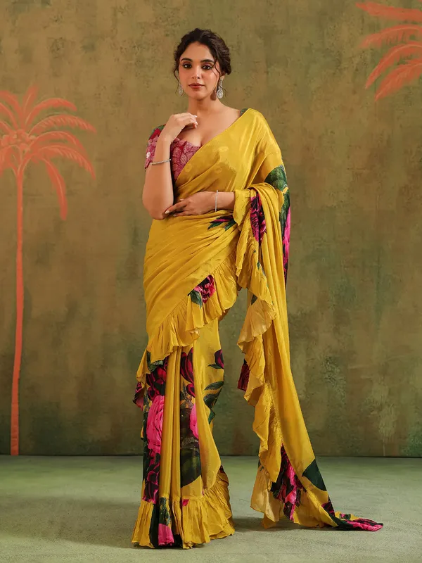 Yellow crepe georgette saree with embellished details