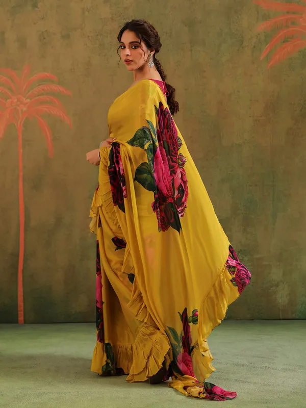 Yellow crepe georgette saree with embellished details