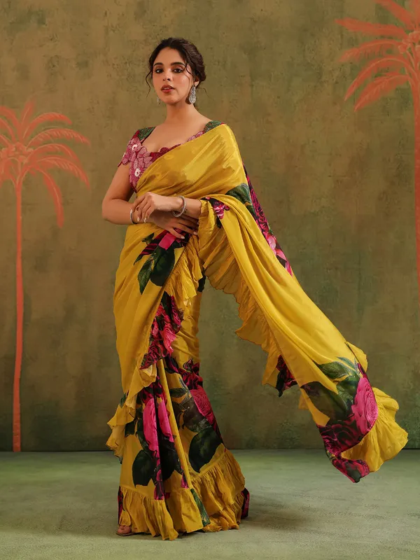 Yellow crepe georgette saree with embellished details