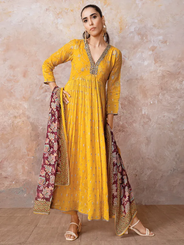 Yellow designer suit for festive celebration