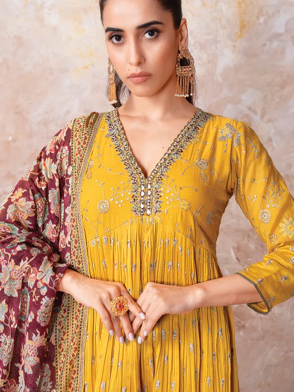 Yellow designer suit for festive celebration